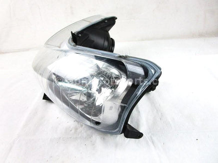 A used Head Light from a 2008 DRAGON 800 155 Polaris OEM Part # 2410397 for sale. Check out Polaris snowmobile parts in our online catalog!