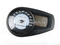 A used Speedometer Gauge from a 2002 RMK 900 Polaris OEM Part # 2410375 for sale. Online Polaris snowmobile parts in Alberta, shipping daily across Canada!
