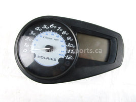 A used Speedometer Gauge from a 2002 RMK 900 Polaris OEM Part # 2410375 for sale. Online Polaris snowmobile parts in Alberta, shipping daily across Canada!