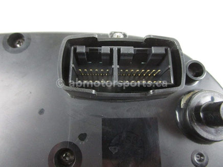 A used Speedometer Gauge from a 2002 RMK 900 Polaris OEM Part # 2410375 for sale. Online Polaris snowmobile parts in Alberta, shipping daily across Canada!