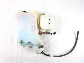 A used Oil And Coolant Tank combo from a 1999 RMK 600 Polaris OEM Part # 5432749 for sale. Polaris snowmobile salvage parts! Check our online catalog for parts!