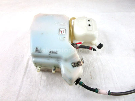 A used Oil And Coolant Tank combo from a 1999 RMK 600 Polaris OEM Part # 5432749 for sale. Polaris snowmobile salvage parts! Check our online catalog for parts!