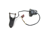 A used Heated Thumb Lever from a 1998 MXZ 500 Skidoo OEM Part # 572090300 for sale. Ski Doo snowmobile parts… Shop our online catalog… Alberta Canada!
