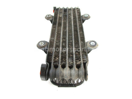 A used Oil Cooler from a 1992 KING QUAD 300 Suzuki OEM Part # 16600-19B00 for sale. Suzuki ATV parts… Shop our online catalog… Alberta Canada!