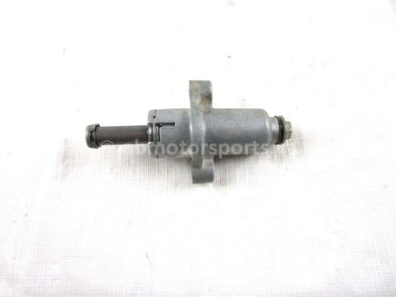 A used Tensioner from a 2000 LTF 500 QUADRUNNER Suzuki OEM Part # 12830-32E00 for sale. Suzuki ATV parts… Shop our online catalog… Alberta Canada!