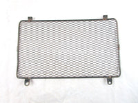 A used Radiator Screen from a 2006 KING QUAD 700 Suzuki OEM Part # 17760-09F00
 for sale. Suzuki ATV parts… Shop our online catalog… Alberta Canada!