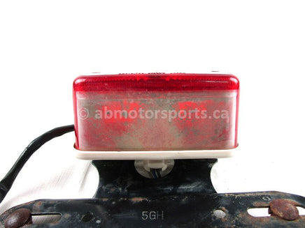 A used Tail light Assembly from a 2000 KODIAK 400FA Yamaha OEM Part # 4XE-84710-00-00 for sale. Yamaha ATV parts… Shop our online catalog… Alberta Canada!