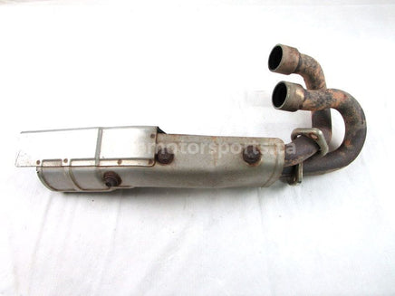 A used Exhaust Pipe from a 2005 GRIZZLY 660 SE Yamaha OEM Part # 5KM-14611-10-00 for sale. Yamaha ATV parts… Shop our online catalog… Alberta Canada!