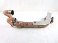 A used Header Pipe from a 2009 GRIZZLY 700 FI Yamaha OEM Part # 3B4-14611-10-00 for sale. Yamaha ATV parts. Shop our online catalog. Alberta Canada!