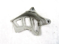 A used Crankcase Guard from a 2001 YZ125 Yamaha OEM Part # 4EX-15421-00-00 for sale. Yamaha dirt bike parts… Shop our online catalog… Alberta Canada!