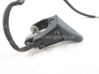 A used Thumb Throttle Lever from a 1994 PHAZER II Yamaha OEM Part # 8AU-82970-00-00 for sale. Yamaha snowmobile parts… Shop our online catalog… Alberta Canada!
