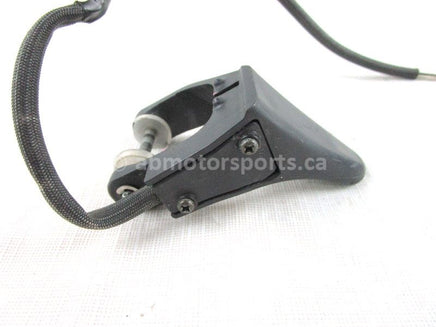 A used Thumb Throttle Lever from a 1994 PHAZER II Yamaha OEM Part # 8AU-82970-00-00 for sale. Yamaha snowmobile parts… Shop our online catalog… Alberta Canada!