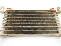 A used Oil Cooler from a 2005 RHINO 660 Yamaha OEM Part # 5UG-E3470-00-00 for sale. Yamaha UTV parts… Shop our online catalog… Alberta Canada!