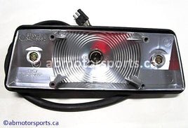 Used Arctic Cat Snow MOUNTAIN CAT 900 Used Arctic at OEM part # 0609-091 tail light with socket assembly for sale 