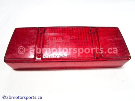 Used Arctic Cat Snow MOUNTAIN CAT 900 OEM part # 0609-090 tail light lens for sale 