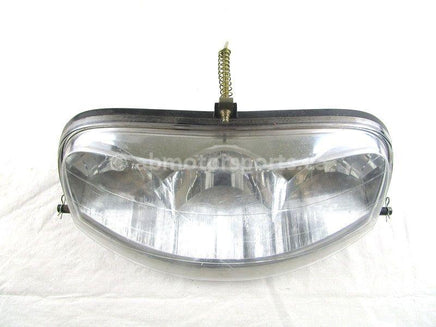 A used Head Light from a 2003 MOUNTAIN CAT 900 1M Arctic Cat OEM Part # 0609-250 for sale. Arctic Cat snowmobile parts? Check our online catalog!