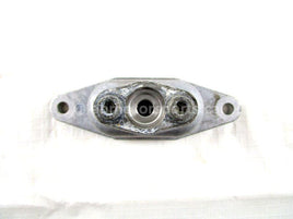 A used Exhaust Valve Cover from a 2010 M8 SNO PRO Arctic Cat OEM Part # 3006-425 Shop online here for your used Arctic Cat snowmobile parts in Canada!
