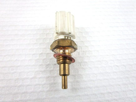 A used Air Temp Sensor from a 2013 HI COUNTRY TURBO SP LTD Arctic Cat OEM Part # 3007-060 for sale. Arctic Cat snowmobile used parts online in Canada!