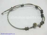 Used Can Am ATV TRAXTER MAX 500 XT OEM part # 705600336 rear brake line for sale