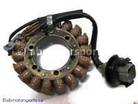 Used Can Am ATV TRAXTER MAX 500 XT OEM part # 420296321 stator for sale