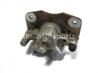 Used Can Am ATV OUTLANDER 800 OEM part # 705600577 rear brake caliper for sale