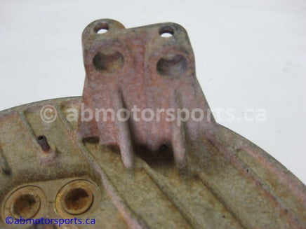 Used Honda ATV TRX 350D OEM part # 43100-HA7-670 rear brake panel for sale