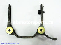 Used Honda ATV TRX 350D OEM part # 61310-HA7-671 head light bracket for sale