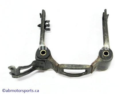 Used Honda ATV TRX 350D OEM part # 61310-HA7-671 head light bracket for sale