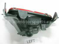 Used Honda ATV TRX 680 FA OEM part # 33160-HN8-003 left tail light for sale