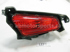 Used Honda ATV TRX 680 FA OEM part # 33160-HN8-003 left tail light for sale