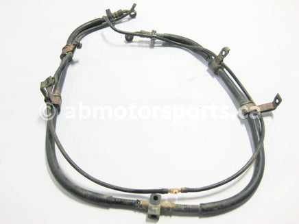 Used Honda ATV TRX 350 FM2 OEM part # 45127-HN5-671 front brake hose for sale