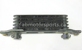 Used Honda ATV TRX 350 FM2 OEM part # 15600-HM7-610 oil cooler for sale