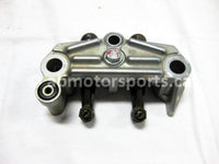Used Honda ATV TRX 350 FM2 OEM part # 14411-HN5-670 rocker arm holder for sale