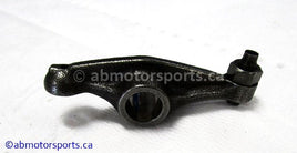 Used Honda ATV TRX 450 FE OEM part # 14431-HM7-000 OR 14431HM7000 rocker arm valve for sale