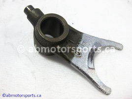 Used Honda ATV TRX 300 FW OEM part # 24213-HA0-000 left gearshift fork for sale