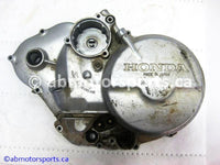 Used Honda ATV TRX 300 FW OEM part # 11330-HC4-010 right crankcase cover for sale