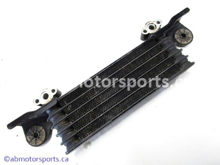 Used Honda ATV TRX 350D OEM part # 15600-HA7-671 oil cooler for sale