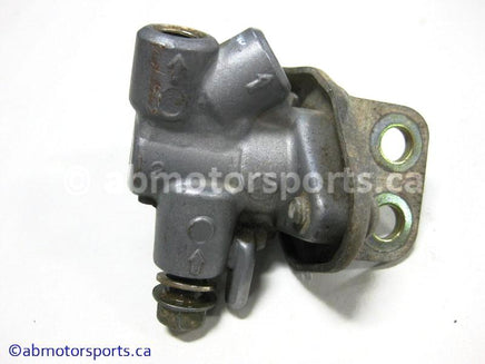 Used Honda ATV TRX 350D OEM part # 46210-HA7-671 brake valve for sale