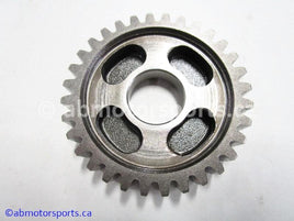 Used Honda ATV TRX 350D OEM part # 23481-HA7-770 main shaft fifth gear for sale