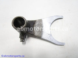 Used Honda ATV TRX 350D OEM part # 24211-HA0-010 right gear shift fork for sale