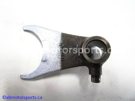 Used Honda ATV TRX 350D OEM part # 24211-HA0-010 right gear shift fork for sale