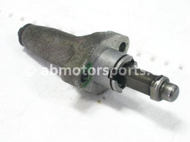 Used Honda ATV TRX 350D FOURTRAX 4X4 OEM part # 14520-HA0-771 tensioner lifter for sale