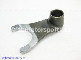 Used Honda ATV TRX 400FW OEM part # 24213-HM7-000 shift fork for sale