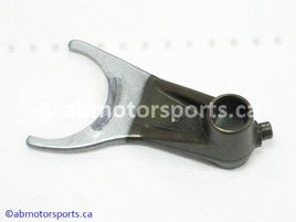 Used Honda ATV TRX 400FW OEM part # 24212-HM7-000 center gearshift fork for sale