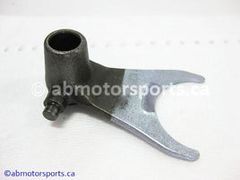 Used Honda ATV TRX 300 FW OEM part # 24211-HA0-010 right shift fork for sale