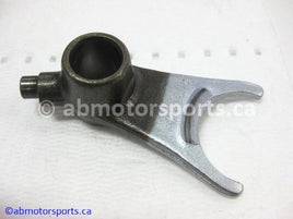 Used Honda ATV TRX 300 FW OEM part # 24213-HA0-000 left gearshift fork for sale