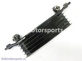 Used Honda ATV TRX 350 FM OEM part # 15600-HM7-610 oil cooler for sale