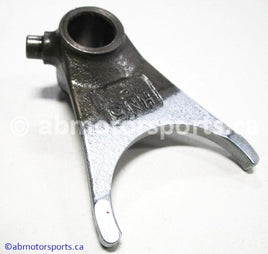 Used Honda ATV TRX 350 FM OEM part # 24211-HN5-670 front gear shift fork for sale