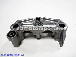 Used Honda ATV TRX 350 FM OEM part # 14411-HN5-670 rocker arm holder for sale