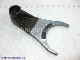 Used Honda ATV TRX 500 FM OEM part # 24211-HM7-000 front shift fork for sale